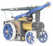 Mamod style live steam crane engine with single oscillating cylinder and spoked aluminium wheels,