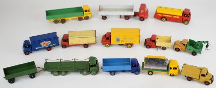 Twelve Dinky Toys diecast model trucks and vans to include Guy Ever Ready, Bedford Heinz, AEC