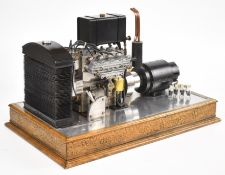 Edgar Westbury Seal four cylinder model petrol engine driving a generator the engine having belt