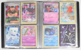 Sixty nine Pokémon cards all EX, V, VMAX, VSTAR, Promo etc, housed in an official Ultra-Pro binder.