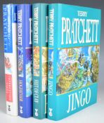 Four signed Terry Pratchett books comprising Jingo 1997 first edition inscribed 'may your camels