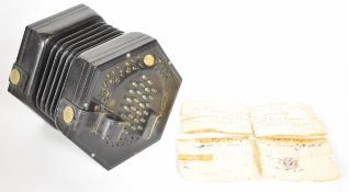 Lachenal & Co fifty-six button concertina with five fold leather bellows and ebony fretwork ends,