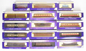 Fifteen Dapol N gauge model railway passenger coaches and goods wagons to include BR and GWR