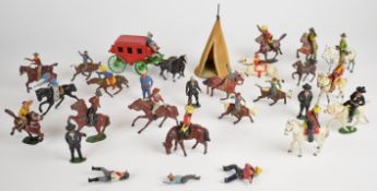 Twenty-eight Timpo and J Hill & Co painted metal cowboys and Indians to include mounted examples,