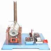 Wilesco D24 live steam engine with pressure gauge and valve to control panel, the single cylinder