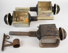 Three carriage or coaching lamps including a pair with plated fittings and silvered reflectors to