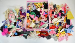 A collection of vintage Pedigree Sindy clothing and accessories, mostly dating 1970's/80's to