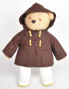 Gabrielle Designs Paddington Bear with brown duffle coat and white Dunlop Wellington boots, height