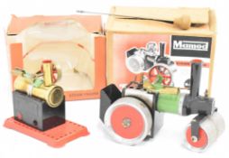 Two Mamod live steam engines comprising Steam Roller S.R.1 and Minor 2, both in original boxes.