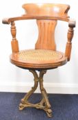 19th or early 20th century cast iron and mahogany ship's chair similar to those fitted to the