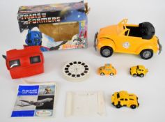 Transformers Viewmaster in original box together with three Bumblee Micromasters and a