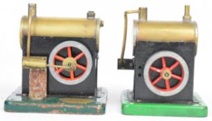 ESL live steam engine with single oscillating cylinder together with a similar smaller engine,