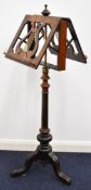 Victorian rosewood dual music stand with brass decoration, on tripod stand, unextended H125cm