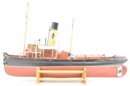 Sheila model steam tug boat with fibreglass hull and detailed deck houses, wheelhouse, windlass