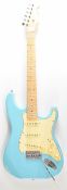 Fender Stratocaster style electric guitar in Laguna blue finish with maple neck, pearlescent