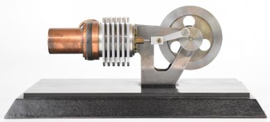 Exhibition quality model of a hot air or Stirling cycle engine, driving a 7cm flywheel, mounted on a