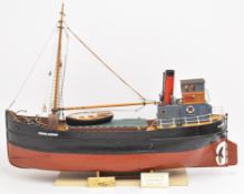 Clyde puffer model steam boat built by Bill Hunt, with fibreglass hull and detailed deck house,