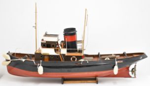 Christine model steam tug boat with fibreglass hull and wood and metal superstructure, having