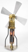 Brass and aluminium hot air or Stirling cycle engine or fan with meths or similar burner below,