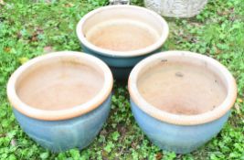 Three glazed jardinières / garden planters comprising a pair and another of similar colour,