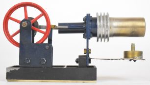 Hot air or Stirling cycle engine with meths burner and single spoked flywheel, overall length 23cm