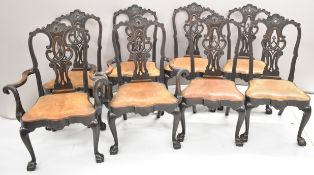 Set of eight possibly Irish 19th century leather seated dining chairs including two carvers, in