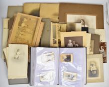Over two hundred Victorian, Edwardian and later photographs of children, many with toys including