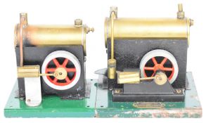 ESL live steam engine with single oscillating cylinder together with a similar smaller engine,