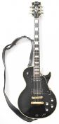 Greco Les Paul 'Black Beauty' style electric guitar in black gloss finish with cream trim,
