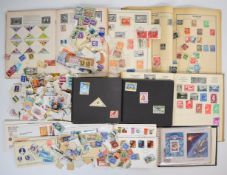 Collection of world stamps in six various junior albums, including loose stamps on paper and