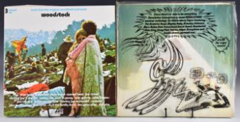 Two Festival triple LPs comprising Revelations Glastonbury Fair with flimsy polythene outer sleeve