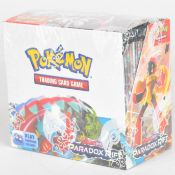 Pokémon TCG Scarlet & Violet 'Paradox Rift' factory sealed booster box containing 36 packs of cards,
