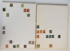 Collection of Australian states stamps in two spiral bound books, all states represented, includes