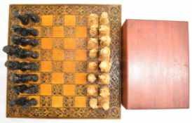 Oversized 'Reynard the Fox' Berkeley chess set, in wooden box with board, height of king 19cm.