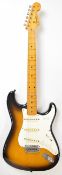Fender Stratocaster electric guitar in sunburst finish with maple neck/fretboard and three single