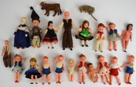 Twenty mid twentieth century miniature dolls with a quantity in traditional European clothing,