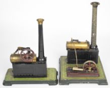Two Bing live steam engines, the larger having reversing lever to the single oscillating cylinder,
