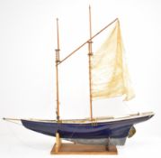 Two masted sailing yacht with working rudder, faux planked deck, brass and copper fittings and