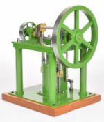 Douglas Russell of Fraserburgh inverted vertical single cylinder live steam engine, raised on four