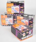 Four boxes of Upper Deck World Cup USA '94 trading cards with two opened, collectively containing