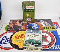 Collection of metal advertising signs, mostly motoring related including Esso, BP, Shell, Michelin