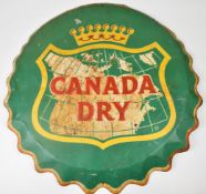 Canada Dry ginger ale pressed metal advertising sign, diameter 77cm