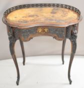19th / 20thC carved leather inset kidney-shaped walnut writing desk with galleried top and moulded