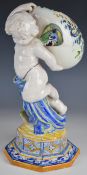 Jacob Petit figure of a cherub carrying a gourd, on plinth, signed to base, H35cm