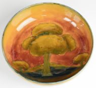 William Moorcroft bowl decorated in the Eventide pattern, signed and with impressed marks to base,