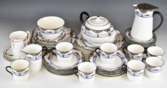 An extensive Shelley tea set decorated in the Swallows pattern including two cake plates, teapot