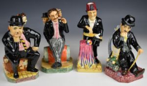 Four Kevin Francis jugs / figures comprising Tommy Cooper, The Marx Brothers, Laurel and Hardy and