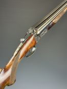 AYA 12 bore side by side shotgun with named and engraved lock, chequered semi-pistol grip and beaver