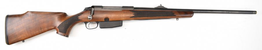Tikka M695 .270 bolt-action rifle with chequered semi-pistol grip and forend, raised cheek piece,