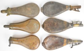 Six shot and powder flasks including James Dixon & Sons and Sykes, largest 23cm long.